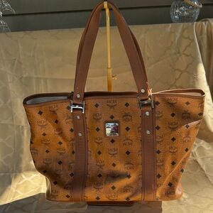 MCM Brown Monogram Tote- discoloration spot